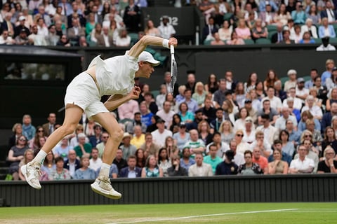 Jannik Sinner serves to Daniil Medvedev